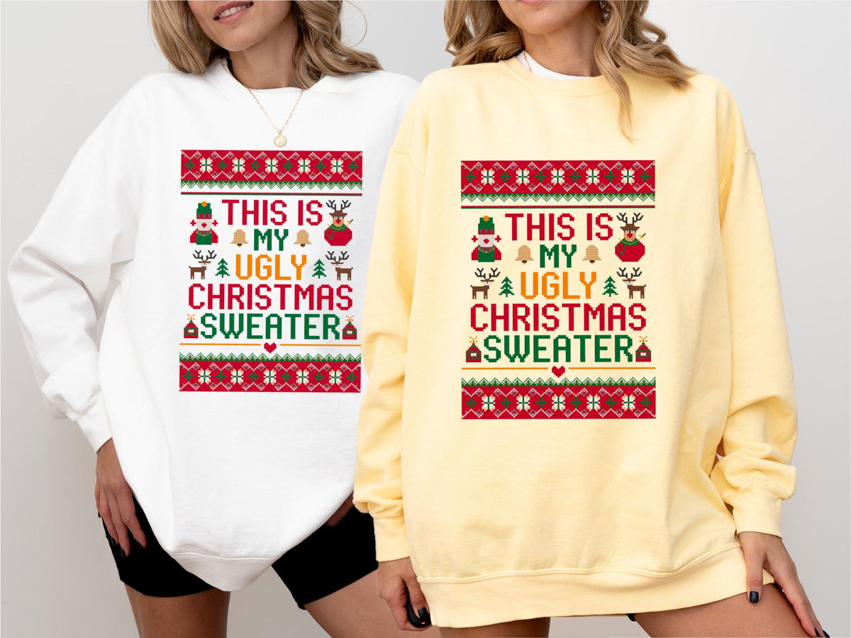 May include: Two sweatshirts, one white and one yellow, each featuring a festive Christmas design. The design includes the text "THIS IS MY UGLY CHRISTMAS SWEATER" with holiday-themed graphics like a snowman, reindeer, and bells.