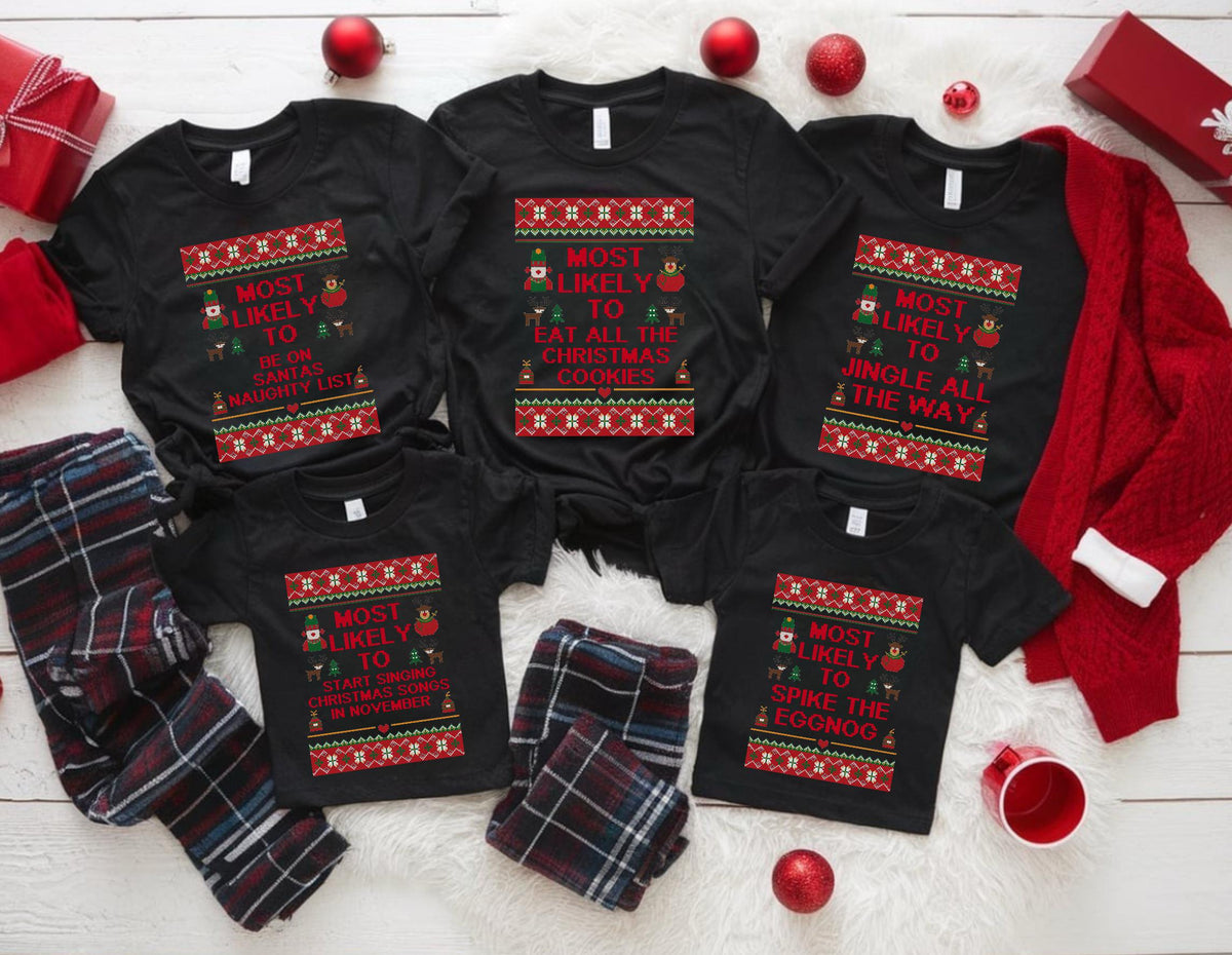 May include: Black t-shirts with festive Christmas-themed text and designs, including phrases like "Most Likely To" and "Eat All The Christmas Cookies." The image also shows plaid pajama pants, a red sweater, and Christmas ornaments.