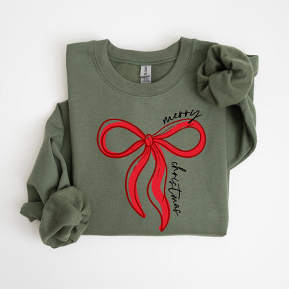May include: An olive green sweatshirt featuring a large red bow design with the words "merry christmas" in a script font. The long-sleeved top is made of a soft material, perfect for the holiday season.