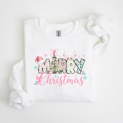 May include: White sweatshirt with a festive "Merry Christmas" design. The design features a Santa hat, Christmas tree, and reindeer antlers, with the words in a mix of patterns and colors, including pink and green. The text "Christmas" is in a cursive font.