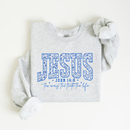 May include: A light gray sweatshirt with the word "JESUS" in large blue floral letters. Below the word "JESUS" is the text "JOHN 14:6" and "the way the truth the life" in a blue script font.