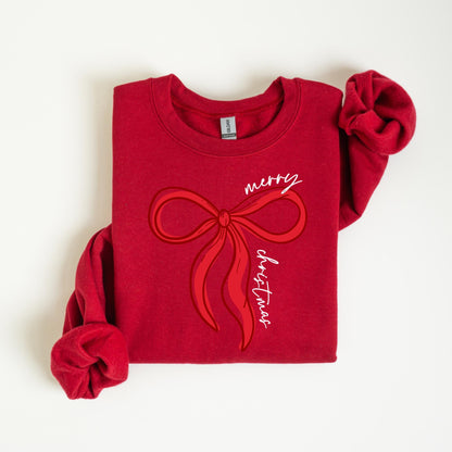 May include: A red sweatshirt featuring a large red bow graphic. The words "merry Christmas" are written in white script. The sweatshirt has long sleeves and a crew neck.