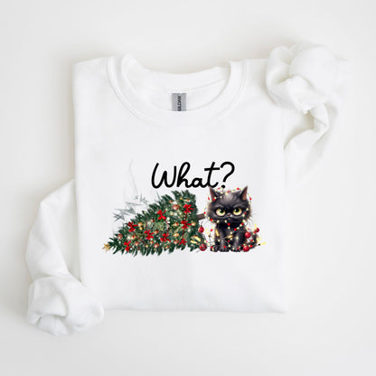 May include: White sweatshirt featuring a graphic of a black cat tangled in Christmas lights next to a fallen Christmas tree. The word "What?" is written above the cat in a black, cursive font. The sweatshirt is made of a soft material.