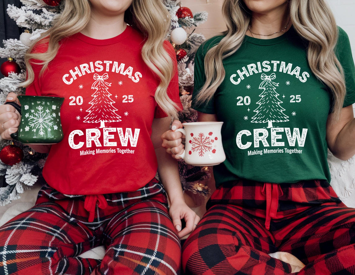 May include: Red and green Christmas Crew t-shirts with matching plaid pajama pants. The shirts feature a Christmas tree graphic and the text "Christmas Crew Making Memories Together". Each person holds a mug.