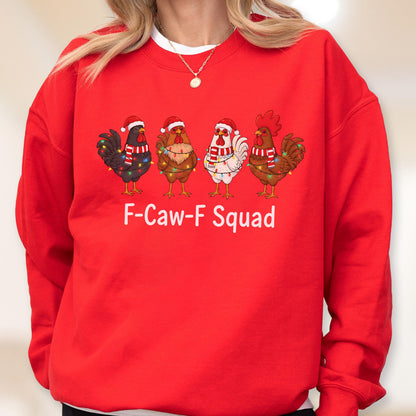 May include: Red sweatshirt featuring four cartoon chickens wearing Santa hats and Christmas lights. The chickens are in a row with the text "F-Caw-F Squad" below them. The sweatshirt is a solid red color.