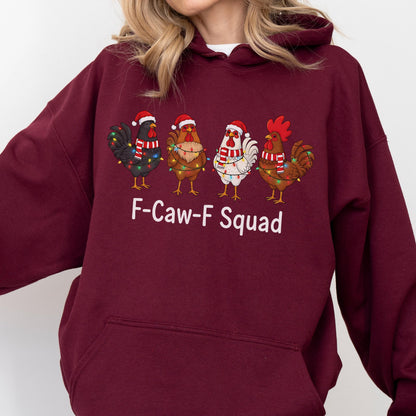 May include: A maroon hoodie featuring a graphic of four cartoon chickens wearing Santa hats and wrapped in Christmas lights. The text "F-Caw-F Squad" is printed below the chickens.