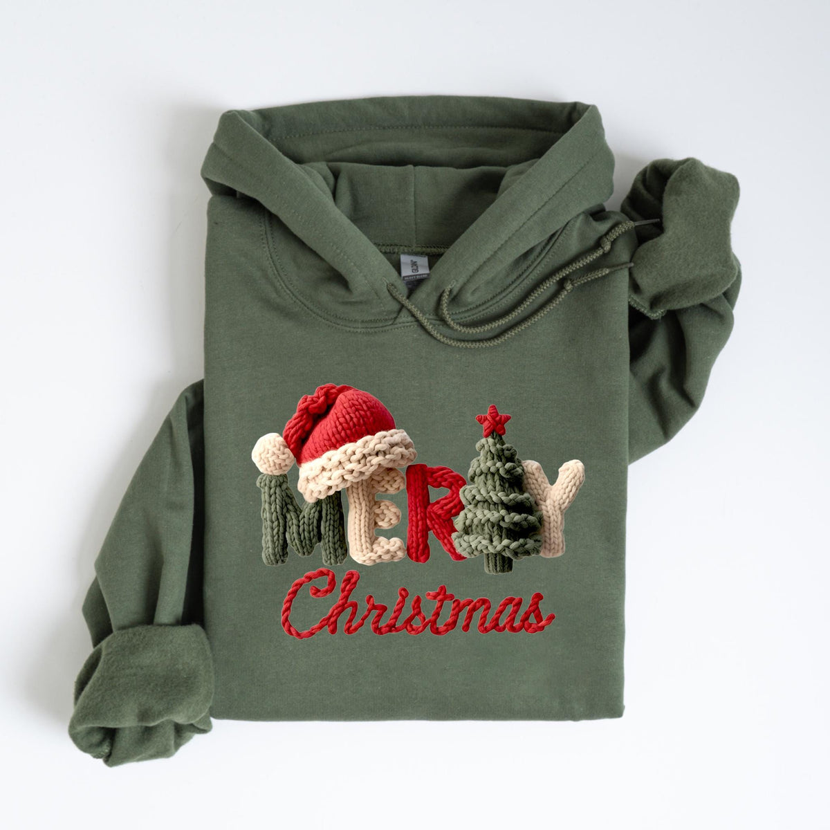 May include: An olive green hoodie with the words "MERRY Christmas" embroidered in red thread. The word "MERRY" features a Santa hat, a Christmas tree, and a mitten. The hoodie has a drawstring hood and long sleeves.