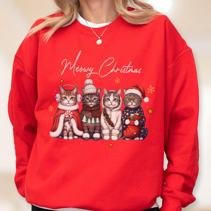 May include: A bright red crewneck sweatshirt featuring the white script text Meowy Christmas above a graphic of four cats. The cats are wearing winter accessories including earmuffs, a knit hat, a scarf, a hoodie, and a Santa hat with a stocking.