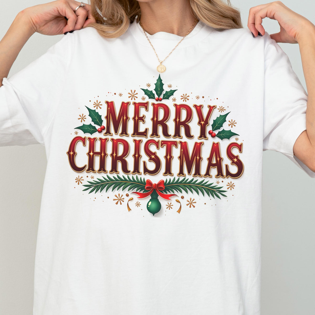 May include: A white t-shirt featuring the text Merry Christmas in a bold red and dark gradient font. The design is decorated with green holly leaves, red berries, pine branches, a red ribbon bow, and small gold starburst accents.