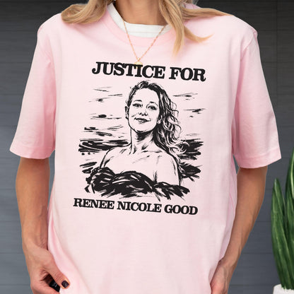 May include: A light pink t-shirt featuring the text "JUSTICE FOR" above a black and white portrait of a woman. Below the portrait, the text reads "RENEE NICOLE GOOD". The shirt has short sleeves and a crew neck.
