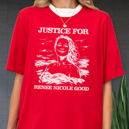 May include: Red t-shirt with the text "JUSTICE FOR" above a white illustration of a woman with long hair, and the text "RENEE NICOLE GOOD" below. The shirt has a white collar and is worn with a gold necklace.