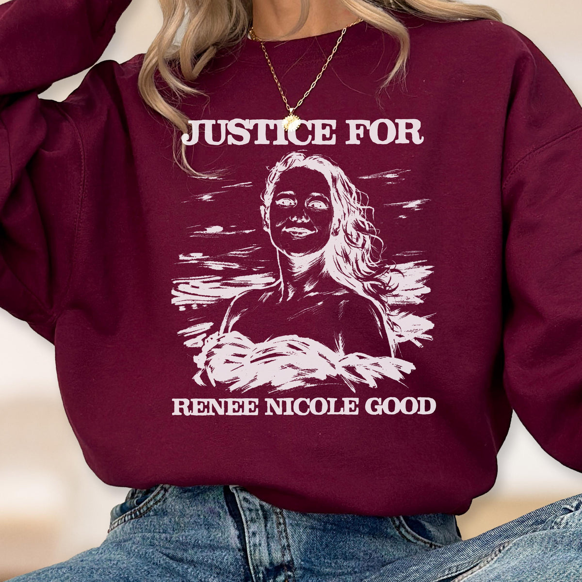 May include: Burgundy sweatshirt with the text "JUSTICE FOR" above a white illustration of a woman's face and the text "RENEE NICOLE GOOD" below. The sweatshirt is a solid color.