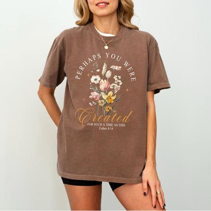 May include: Brown t-shirt with a floral bouquet graphic and the text "Perhaps You Were Created For Such A Time As This" from Esther 4:14. The design features a variety of flowers in shades of pink, yellow, and white.