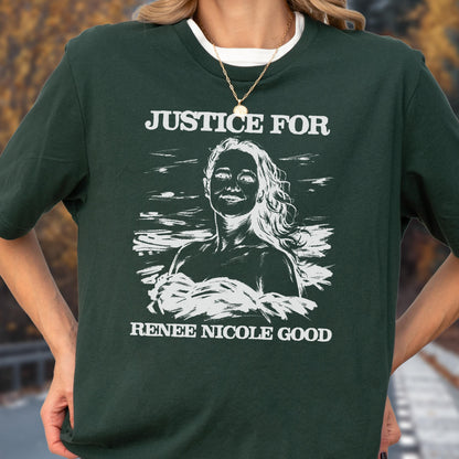 May include: Dark green t-shirt with the text "JUSTICE FOR" above a white illustration of a woman's face and the text "RENEE NICOLE GOOD" below. The shirt has a white crew neck collar.