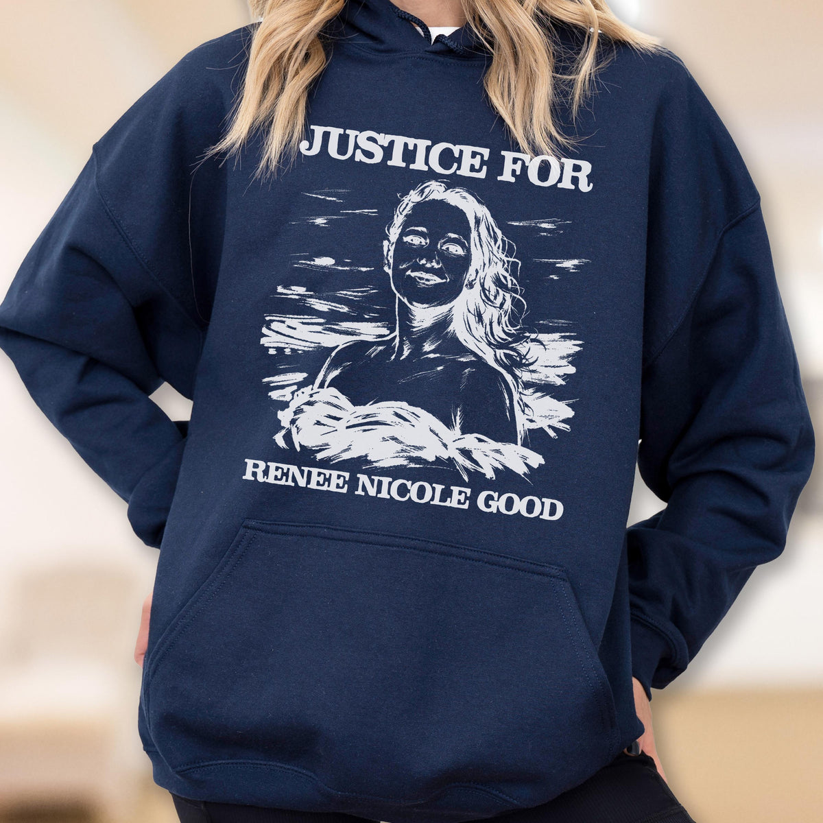 May include: Navy blue hoodie with a white graphic. The graphic features the text "JUSTICE FOR" above a portrait of a woman, with the text "RENEE NICOLE GOOD" below the portrait.