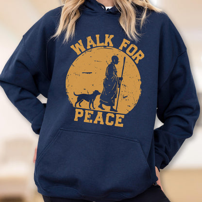 May include: Navy blue hooded sweatshirt with a graphic of a person walking with a dog and staff inside a yellow circle. The words "WALK FOR PEACE" are printed in yellow.