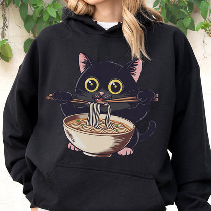May include: Black hoodie featuring a cartoon black cat eating ramen noodles with chopsticks. The cat has large yellow eyes and pink ears and paws. The ramen bowl is beige with noodles and green garnish. The hoodie is a solid black color.