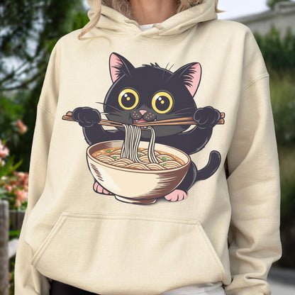 May include: A beige hoodie featuring a cartoon black cat holding chopsticks and a bowl of ramen. The cat has large yellow eyes and pink paws. The ramen bowl is beige with brown noodles and green garnish.