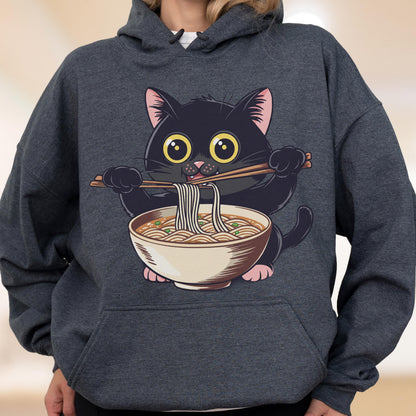 May include: Dark gray hoodie featuring a cartoon black cat eating ramen noodles with chopsticks. The cat has large yellow eyes and pink ears and paws. The ramen bowl is beige with noodles and green garnish.