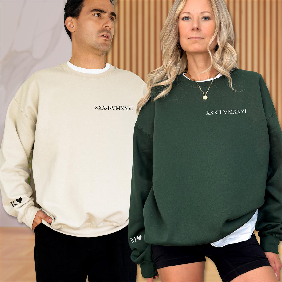 May include: A beige crewneck sweatshirt with the black text XXX-I-MMXXVI on the chest and a K with a heart symbol on the sleeve, alongside a dark green crewneck sweatshirt with white text XXX-I-MMXXVI and an M with a heart symbol on the sleeve.