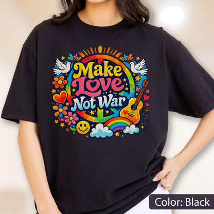 May include: Black t-shirt with a colorful graphic that says "Make Love Not War." The design includes a peace sign, rainbow, guitar, flowers, doves, and a smiley face. The shirt is a relaxed fit.