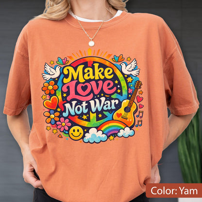 May include: A yam-colored t-shirt with a colorful graphic that says "Make Love Not War." The design includes a peace sign, rainbow, guitar, flowers, doves, and a smiley face. The shirt is short-sleeved.