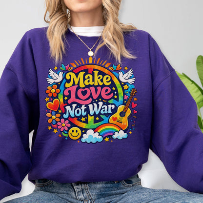 May include: A purple sweatshirt with a colorful graphic that says "Make Love Not War." The design includes a peace sign, flowers, a rainbow, a guitar, and doves. The sweatshirt is a casual style.