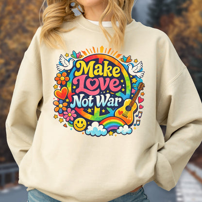 May include: Beige sweatshirt with a colorful graphic that says "Make Love Not War." The design includes a peace sign, rainbow, guitar, flowers, doves, and a smiley face. The sweatshirt is a casual, comfortable style.