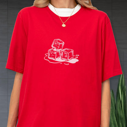 May include: Red t-shirt with a white crew neck collar and a white graphic of three melting ice cubes. The ice cubes are outlined in white, with white drips of water around them. The shirt has short sleeves.
