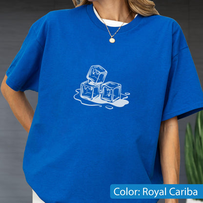 May include: Royal Cariba blue t-shirt featuring a white graphic of three melting ice cubes. The shirt has short sleeves and a crew neck, with a white undershirt visible. The text "Color: Royal Cariba" is at the bottom of the image.