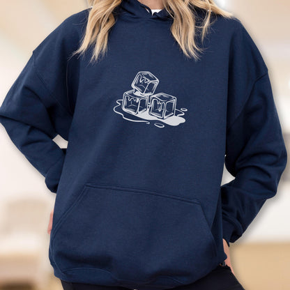 May include: Navy blue hoodie with a white graphic of three melting ice cubes. The hoodie has a front pocket and a drawstring hood. The design is centered on the chest.