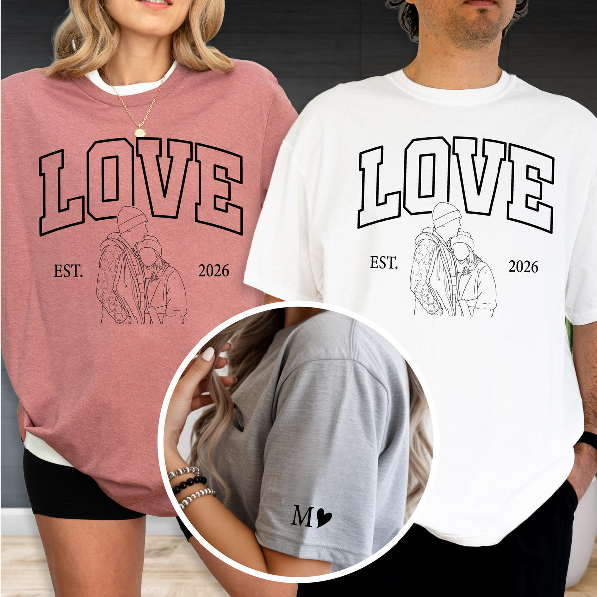 May include: A pair of matching shirts, one dusty rose and one white, featuring the word "LOVE" in bold black letters. Below the word is a line drawing of a couple and the text "EST. 2026". The sleeve of one shirt has the letter "M" and a heart.