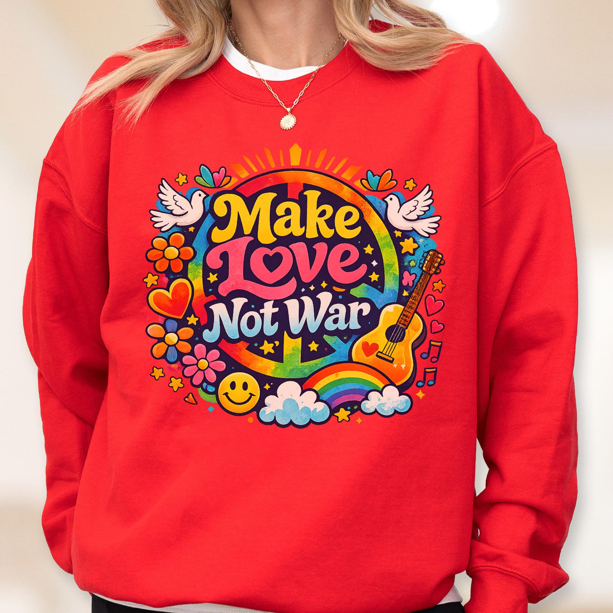May include: Red sweatshirt with a colorful graphic that says "Make Love Not War." The design includes a peace sign, guitar, rainbow, flowers, doves, and a smiley face. The sweatshirt has a crew neck.