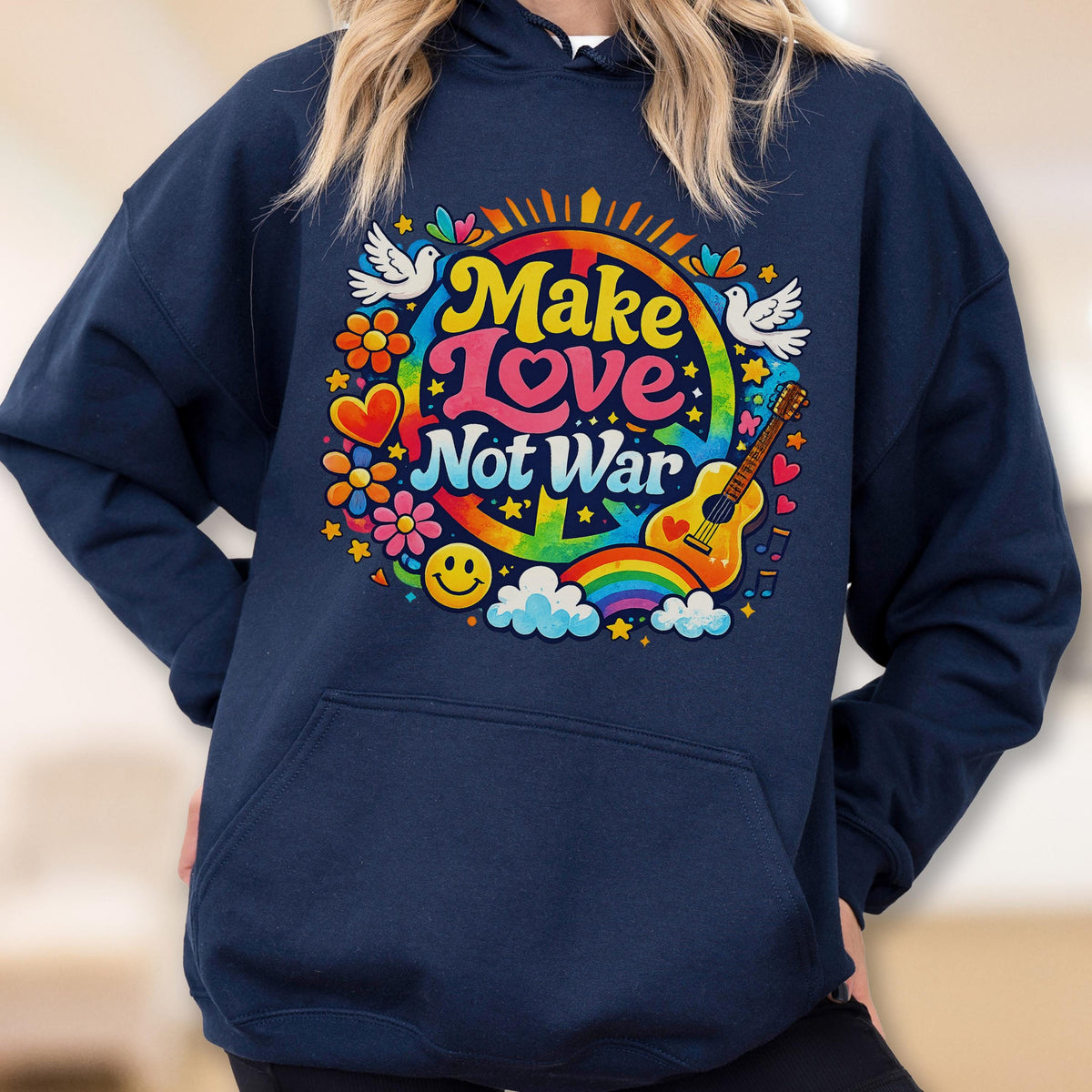 May include: Navy blue hoodie with a colorful graphic that says "Make Love Not War." The design includes a peace sign, guitar, rainbow, flowers, doves, and a smiley face. The hoodie has a front pocket and a hood.