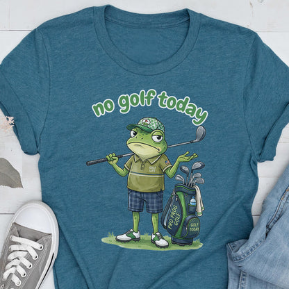 May include: Teal t-shirt featuring a cartoon frog with a golf club and golf bag. The frog is wearing a golf hat, polo shirt, and plaid shorts. Text on the shirt reads "no golf today". The golf bag has the text "Pro Frog Golf" and "Golf Today".