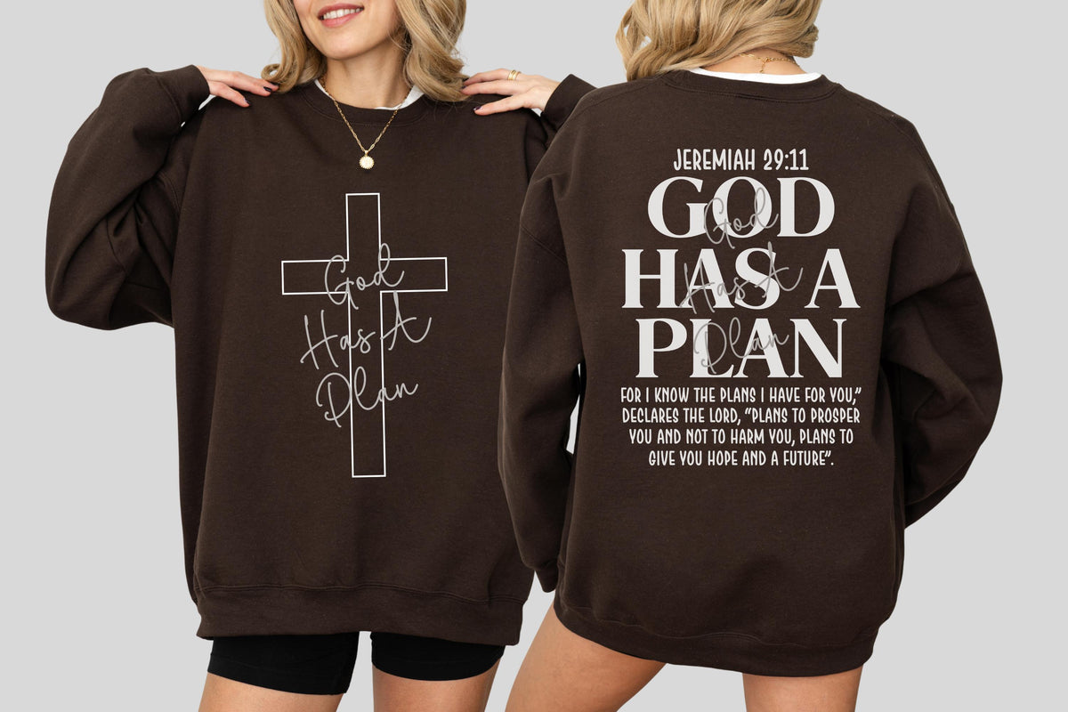 May include: A brown sweatshirt with the text "God Has A Plan" and a cross design on the front. The back of the sweatshirt features the text "Jeremiah 29:11 GOD HAS A PLAN" with a Bible verse.