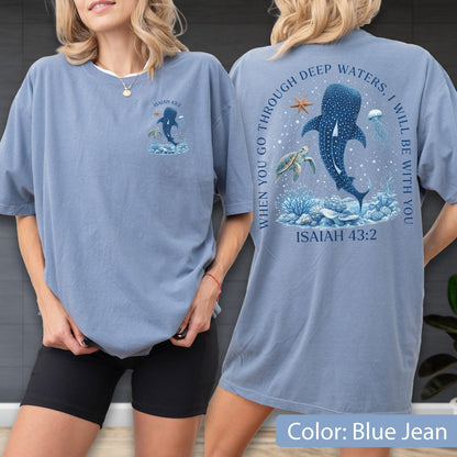 Front and back design of a majestic whale shark with Isaiah 43:2 bible verse typography, deep blue ocean aesthetic, minimalist Christian graphic apparel for sea lovers.