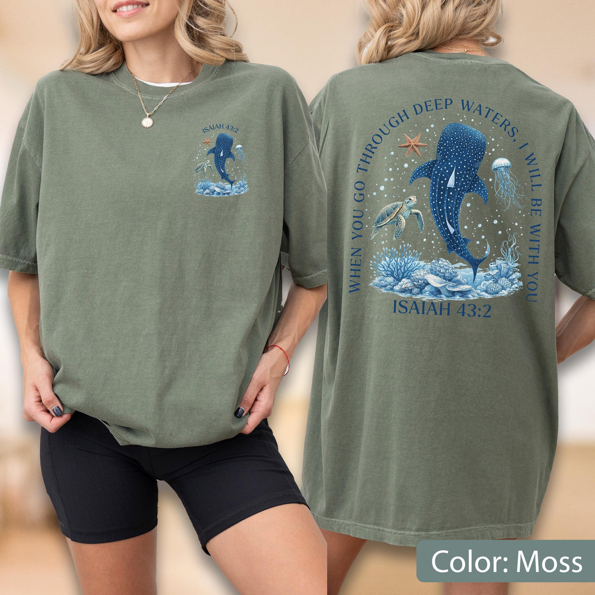 May include: Moss green t-shirt with a marine-themed graphic. The front features a whale shark illustration with the text "ISAIAH 43:2". The back displays a larger design with the text "WHEN YOU GO THROUGH DEEP WATERS, I WILL BE WITH YOU" and "ISAIAH 43:2".
