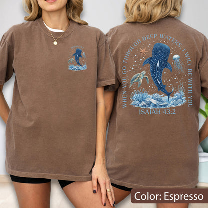 May include: Espresso-colored t-shirt featuring a whale shark design with the text "WHEN YOU GO THROUGH DEEP WATERS, I WILL BE WITH YOU" and "ISAIAH 43:2". The design includes a turtle, jellyfish, and coral.