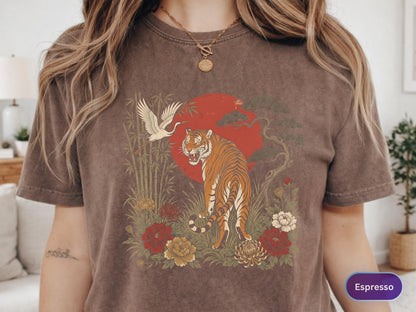 May include: Espresso-colored t-shirt featuring a tiger illustration. The design includes a red sun, crane, bamboo, and flowers. The tiger is orange and black, with the word "Espresso" in a purple oval.