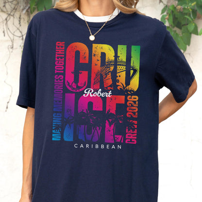 May include: Navy blue t-shirt with a white collar featuring the word "CRUISE" in rainbow colors, a cruise ship graphic, and the name "Robert". The text "MAKING MEMORIES TOGETHER", "CREW 2026", and "CARIBBEAN" are also displayed.