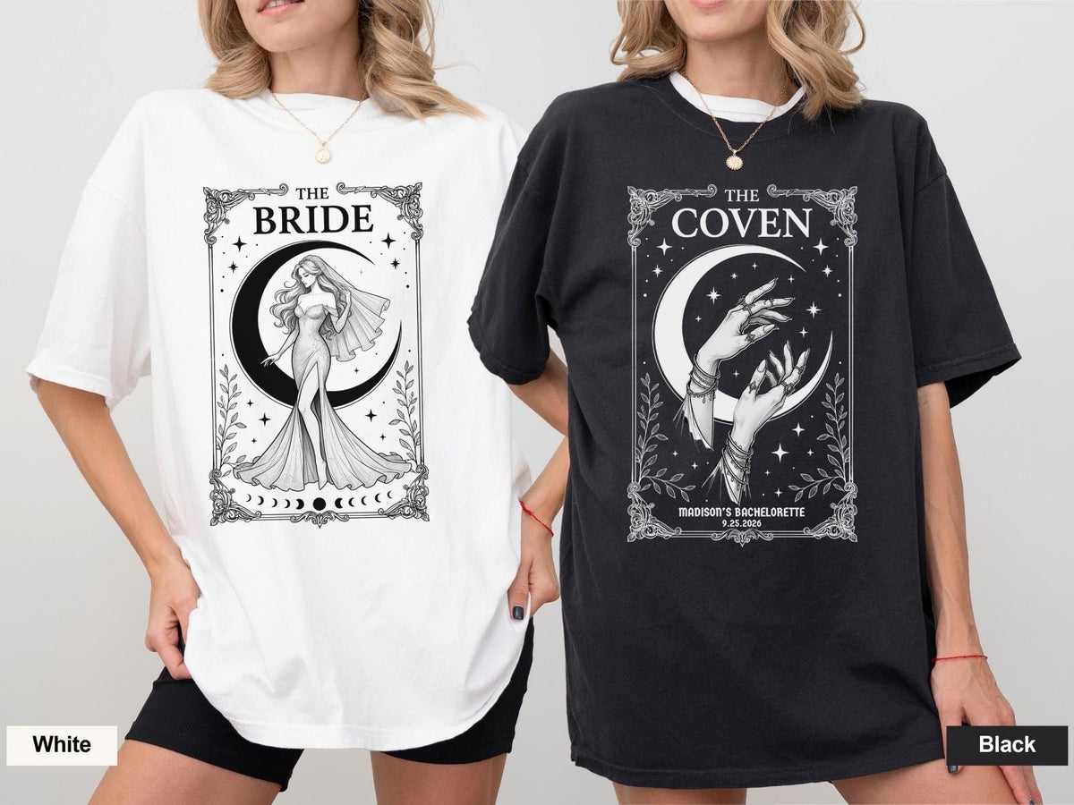 May include: A white t-shirt featuring a black graphic of a bride and a crescent moon with the text THE BRIDE, and a black t-shirt featuring a black and white graphic of hands and a crescent moon with the text THE COVEN MADISON'S BACHELORETTE 9.25.2026.
