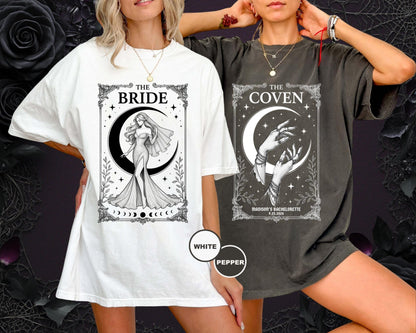 May include: A white t-shirt featuring a black graphic of a bride in a gown under a crescent moon with the text THE BRIDE, and a charcoal gray t-shirt featuring a black graphic of hands under a crescent moon with the text THE COVEN.