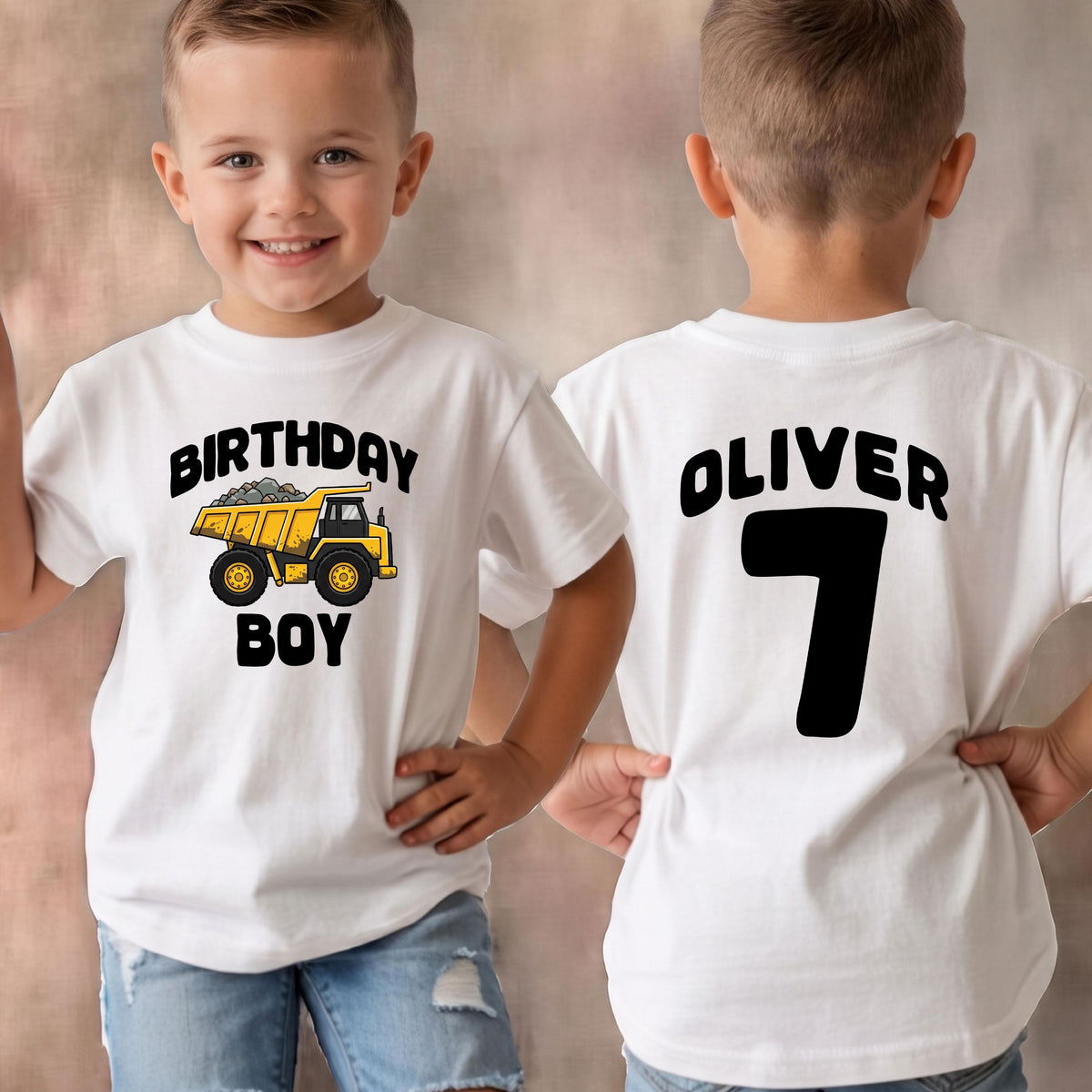 May include: A white t-shirt featuring a yellow dump truck graphic with the text BIRTHDAY BOY on the front and the name OLIVER with the number 7 in large black lettering on the back, showcasing both sides of the garment in one view.
