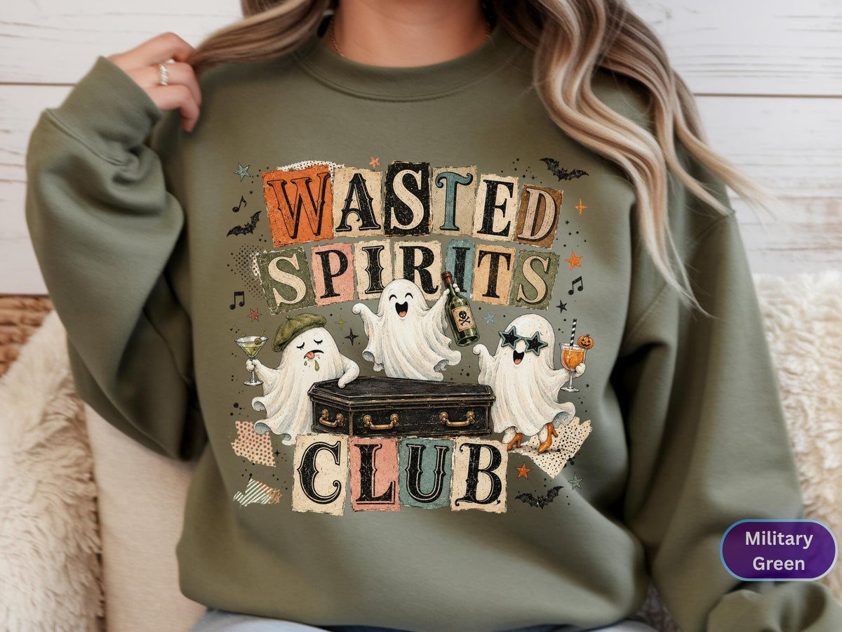 May include: A military green sweatshirt featuring a graphic print with the text "WASTED SPIRITS CLUB" in block letters. The design includes three white ghosts, one holding a martini glass, one holding a bottle, and one wearing star-shaped sunglasses.