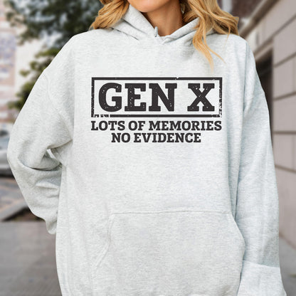 May include: A light gray hooded sweatshirt featuring a black rectangular graphic with the text GEN X in a bold, distressed font, followed by the text LOTS OF MEMORIES NO EVIDENCE in a matching black, sans-serif, distressed typeface.