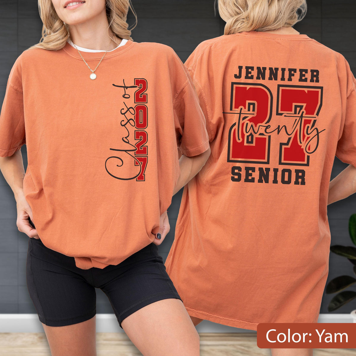 May include: A yam-colored t-shirt featuring black and red text. The front displays vertical text reading Class of 2027. The back features the name Jennifer above the large red number 27, with the word twenty in script and the word SENIOR below.