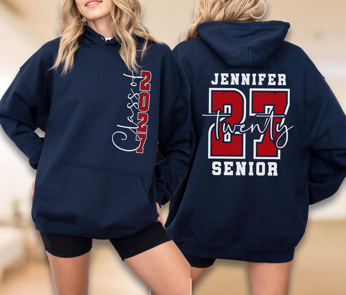 May include: A navy blue hooded sweatshirt featuring a front graphic that reads Class of 2027 in white script and red block lettering. The back displays the name Jennifer above the number 27 in red, with the word twenty in script and Senior below.