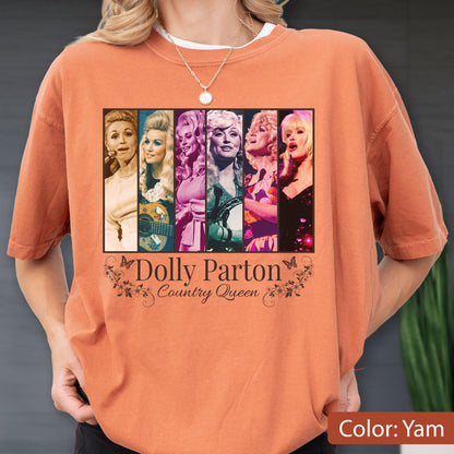 May include: A yam-colored t-shirt featuring a graphic print of six vertical panels showing various portraits of Dolly Parton. Below the panels, the text reads Dolly Parton Country Queen, flanked by small butterfly and floral illustrations.