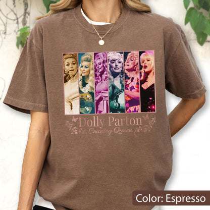 May include: An espresso-colored short-sleeve t-shirt featuring a graphic print of six vertical panels displaying various images of Dolly Parton. Below the panels, the text reads Dolly Parton Country Queen, accompanied by small butterfly illustrations.